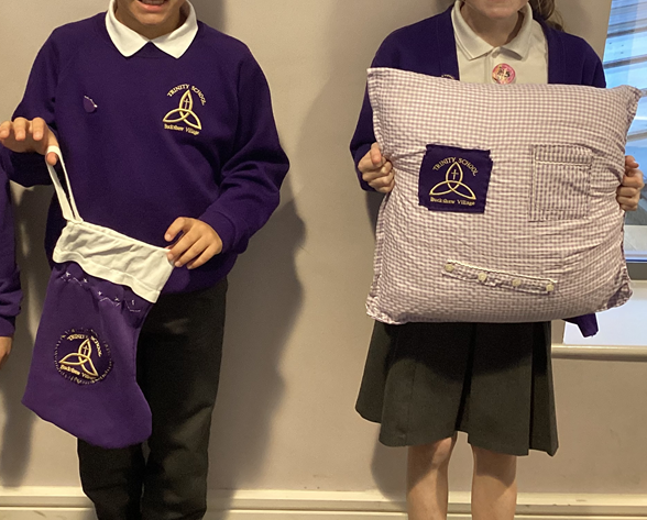 children holding crafts