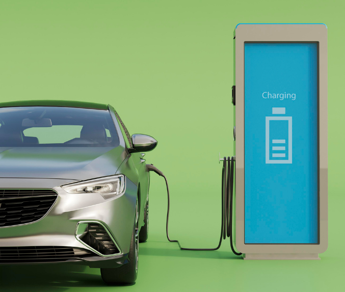image of car plugged into an e charging point